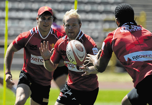 MONEYBALL: Scrumhalf Ross Cronje of the Xerox Golden Lions goes through his paces during training ahead of the Currie Cup final against Western Province at Newlands on Saturday