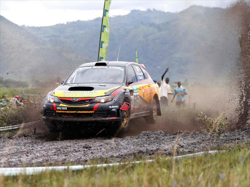 Duncan Mubiru co driven by Musa Nsibuga in Subaru Impreza N16 during the KCB Kisumu Rally October 18, 2014.