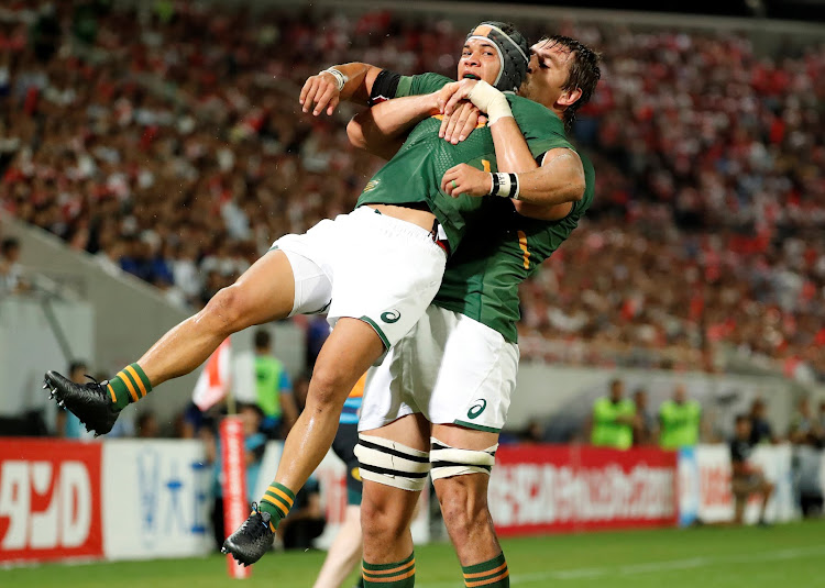 South Africa's Cheslin Kolbe celebrates scoring their first try with Eben Etzebeth.