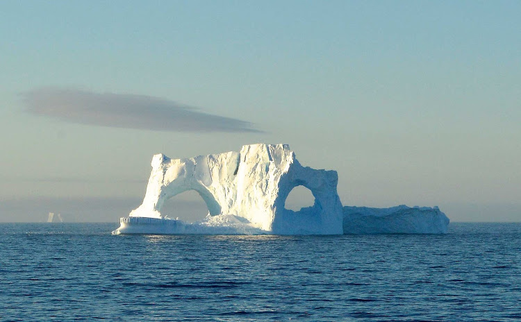 An iceberg disguised as a Phantom of the Opera mask seen during a sailing to Antarctica. 