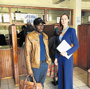 DA councillor Malibongwe Xhelisilo and DA MP Terri Stander open a case against municipal leaders at the Komani police station.