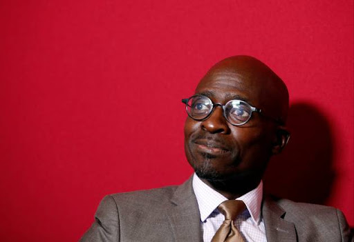 Finance Minister Malusi Gigaba speaks with journalists at the World Economic Forum on Africa 2017 meeting in Durban, on May 5, 2017.