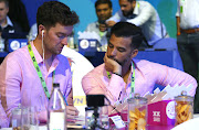 Paarl Royals coach JP Duminy (R) in discussion with his team members during the 2023 SA20 Auction held at Cape Town International Convention Centre in Cape Town on September 19 2022. 