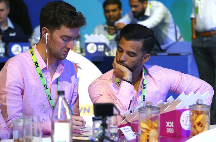 Paarl Royals coach JP Duminy (R) in discussion with his team members during the 2023 SA20 Auction held at Cape Town International Convention Centre in Cape Town on September 19 2022.