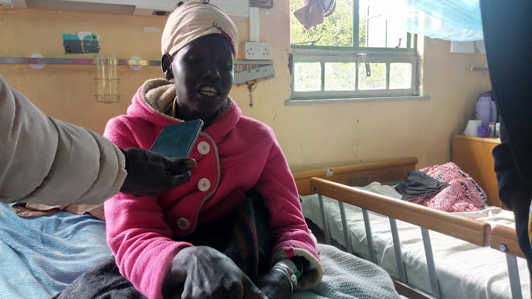 Survivor Gladys Kandagor, 28, at Baringo referral hospital in Kabarnet town on Friday.