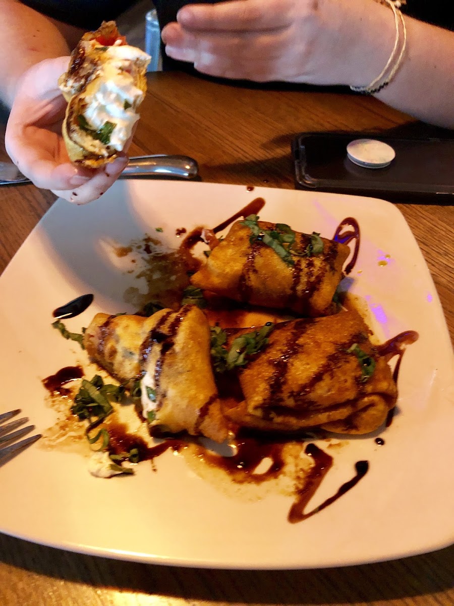 Caprese bites. This appetizer could be a meal for two all by themselves. Gf crepes, stuffed with cream cheese, basil and fresh tomatoes, fried and drizzled with a balsamic dressing. Delicious!