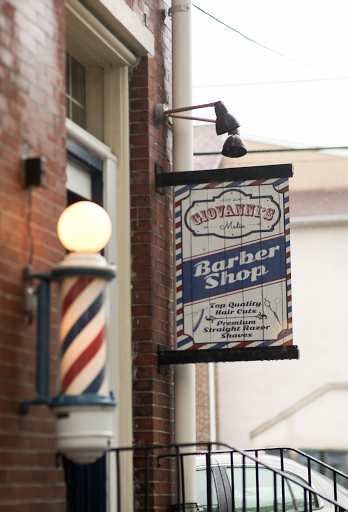Giovanni’s Media Barber Shop logo