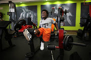 Caleb grimaces as he demonstrates how he works his legs, during an intense training session at Trinergy Health and Fitness Centre, close to the orphanage where he lives. The 19 year old was born with a sickle-cell disease (SCD) in The Democratic Republic of Congo (DRC) and now lives at Kids Haven, an orphanage east of Johannesburg. His trainer , Ryan Manthe of Trinergy Health and Fitness Centre, was inspired to help him after seeing him get up on stage with other bodybuilders at a competition in Kempton Park.