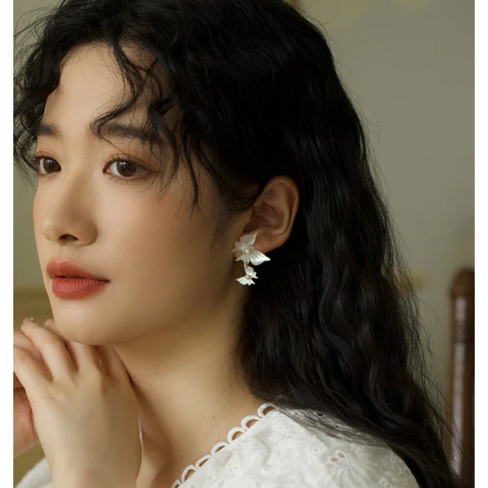 Title 8, Butterfly natural pearl earrings and mosquito i...
