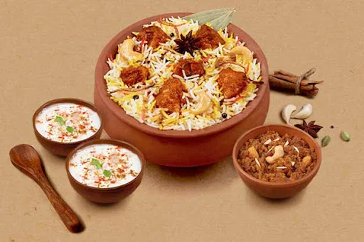 1 KG Bhuna Chicken Matka Biryani + FREE Dessert