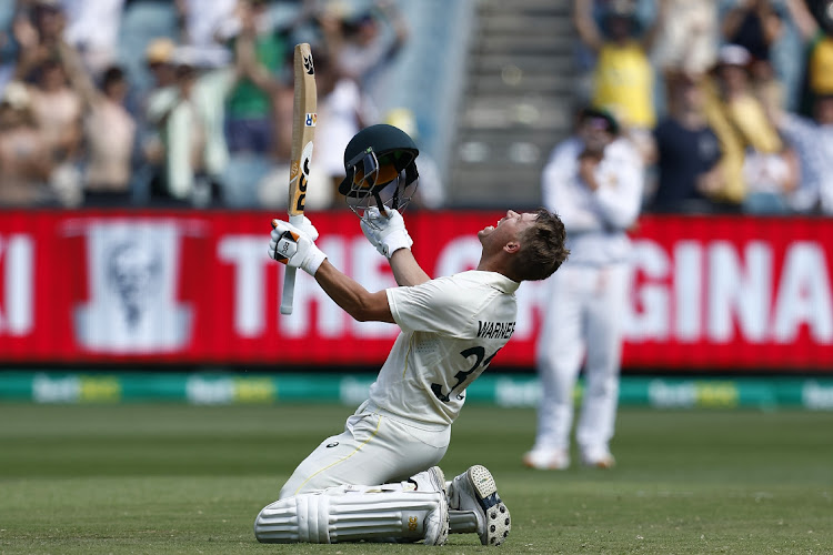 David Warner of Australia celebrates his double century on day 2 of the second Test against South Africa at the Melbourne Cricket Ground on December 27 2022.