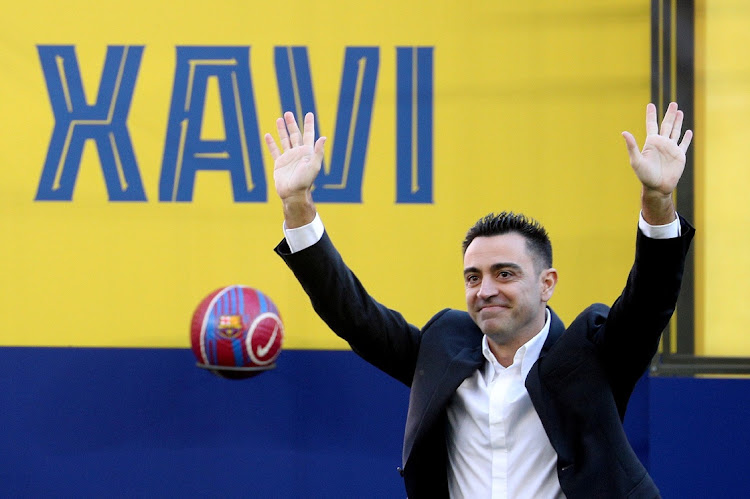 FC Barcelona unveil new coach Xavi.