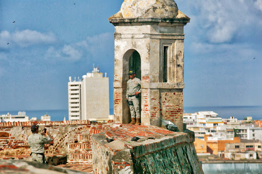 A Colombian soldier poses at Castillo San Felipe de Barajas in Old Cartagena, Colombia. 