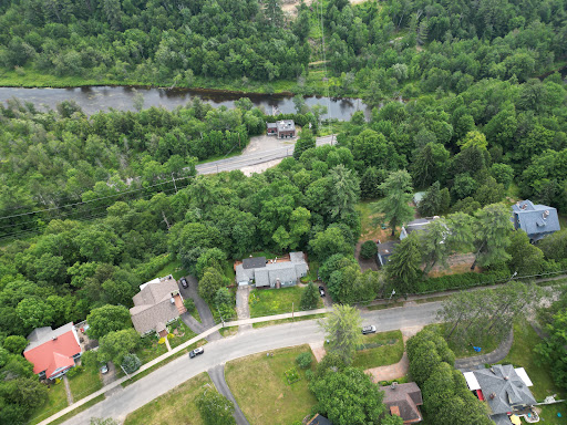 Residential area near river in this luxury house for sale in Saranac Lake ($475,000)