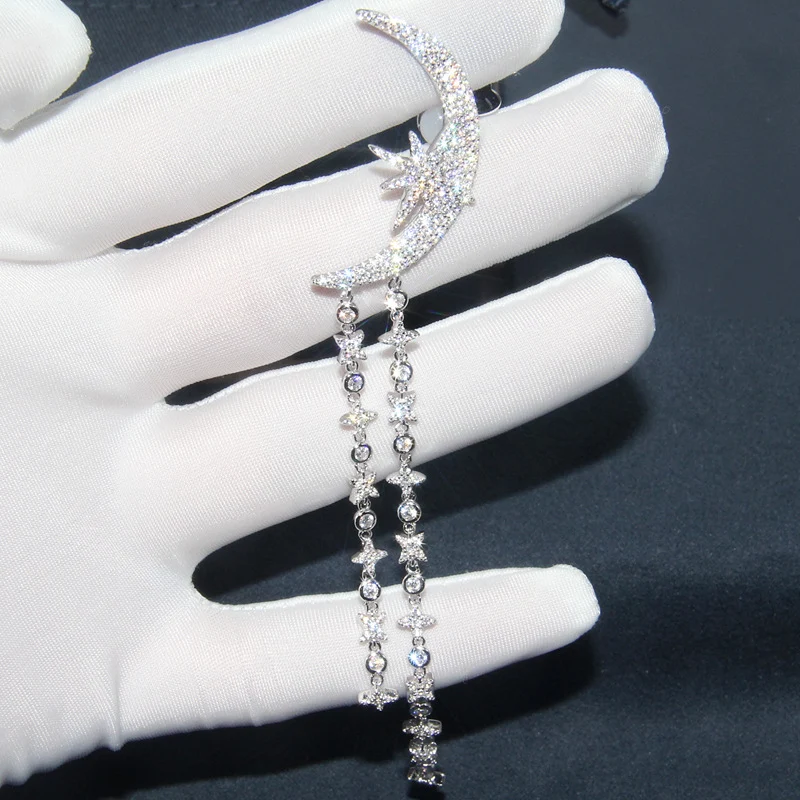 Lange S925 zilveren oorbellen voor dames met kristal diamant, maan en kwastje design, Europese en Amerikaanse stijl, elegant.