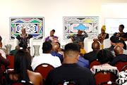 Thebe  Ikalafeng, Gauteng MMC Morakane Mosupyoe and Minister of Sports, Arts and Culture, Zizi Kodwa listen to Unathi Nkayi during the official launch of the inaugural Cultural and Creative Industry Awards (CCIAs) “Recognising the brightest stars.” at the Melrose Gallery, Melrose Arch, in Johannesburg.

