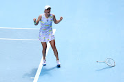 Iga Swiatek celebrates match point in her Women's singles quarterfinal match against Kaia Kanepi during day 10 of the Australian Open at Melbourne Park on January 26 2022.