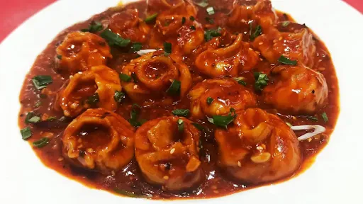 Veg Chilli Gravy Momos (6 Pcs)