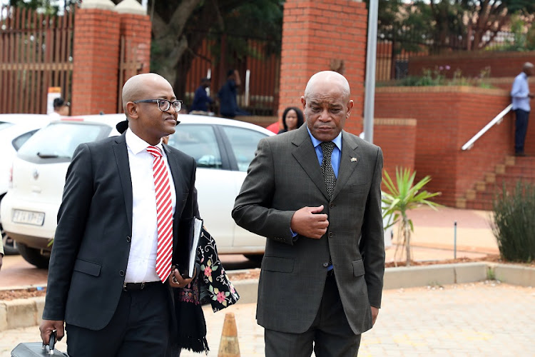 Peter-Paul Ngwenya, seen here with his legal representative, is facing a crimen injuria case after he called former business partner Fani Titi the k-word