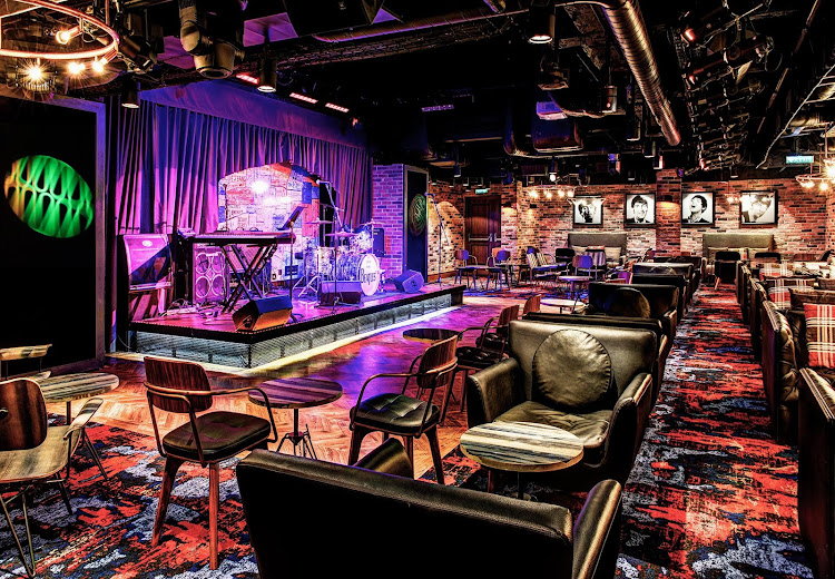 The Cavern Club on Norwegian Epic is the place for live music and sharing drinks with new friends. 