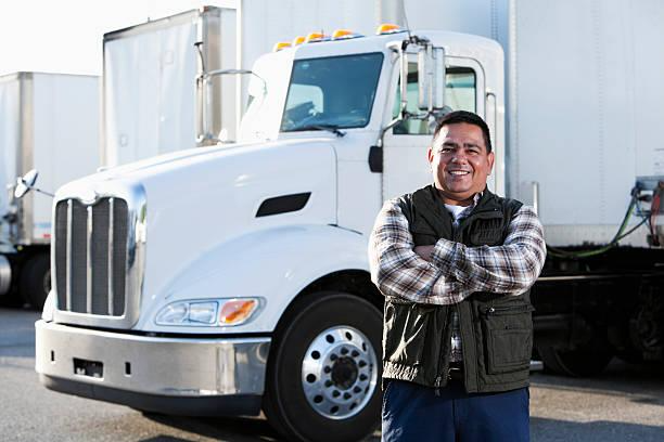 https://media.istockphoto.com/id/174924208/photo/hispanic-truck-driver.jpg?b=1&s=612x612&w=0&k=20&c=Mq8cWZK-ybRUX2arNwXLZmWEDbokVfq3JoT4M9TAqaA=