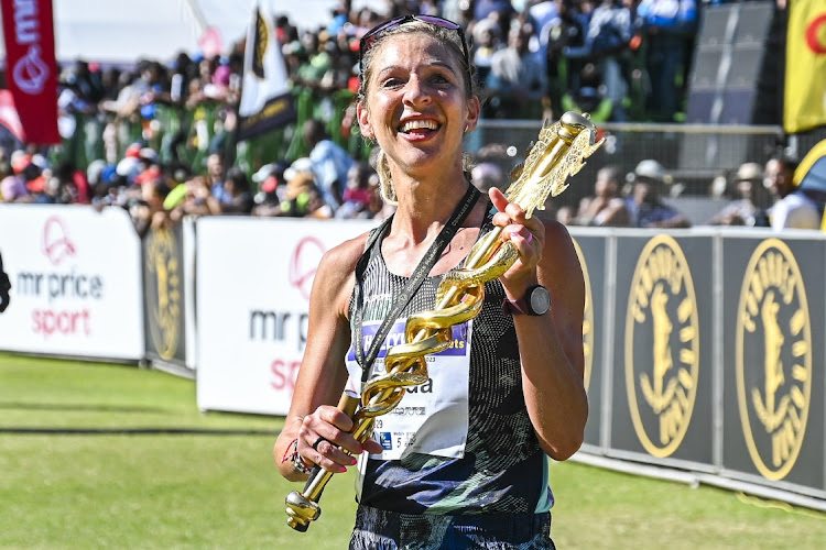 Gerda Steyn with the trophy after winning the Comrades Marathon at Kingsmead Stadium in Durban on Sunday. Picture: GALLO IMAGES/DARREN STEWART