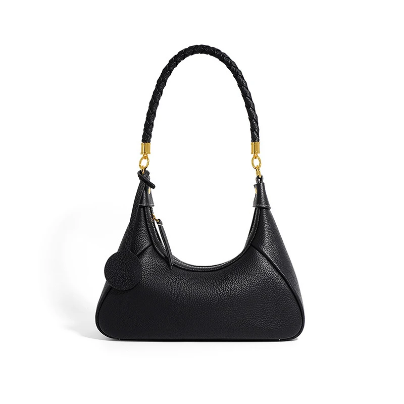 Bolsa de ombro feminina com textura de couro de vaca moderna e estilosa. Perfeita para usar sob o braço. Um acessório elegante e prático.