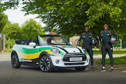 Sled pilot Shanwayne Stephens, 29, and brakeman Nimroy Turgott, 27, have been pushing a Mini up and down a private road in Peterborough for resistance training during lockdown. 