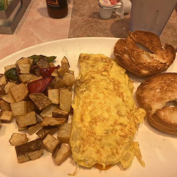 Udi bagel, cheese and onion omlet, breakfast potatoes