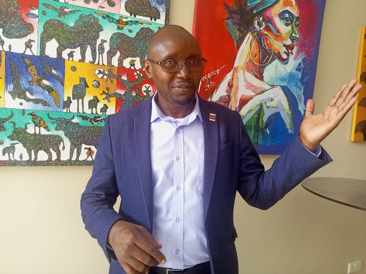 The AIDS Healthcare Foundation Kenya Country Programme Director Samuel Kinyanjui speaks on October 26, 2023