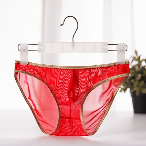 Title 7, Ultra-thin mens mesh briefs with gold trim, of...