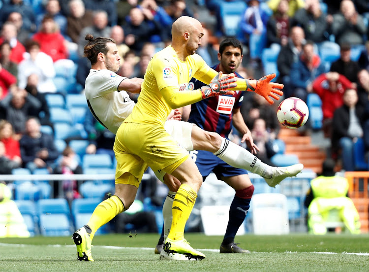 Real Madrid's Gareth Bale in action with Eibar's Marko Dmitrovic