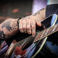 Hands, tattoo and music  di 