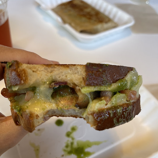 Grilled cheese with cheddar, tomato, bacon, and pesto