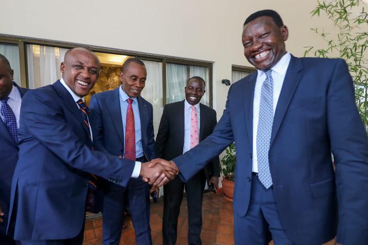 Makueni governor Mutula Kilonzo share a light moment with Energy Cabinet Secretary Davis Chirchir after holding a meeting with Nation Assembly’s Departmental Committee on Energy on 2/03/2023 on the proposed amendments to the Energy Act 2019. Looking is Kiambu governor Kimani Wamatangi and his Nandi counterpart Stephen Sang