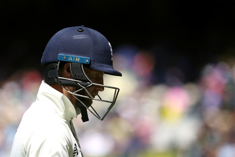 England's Joe Root walks off after losing his wicket in the third Test against Australia at Melbourne Cricket Ground, on December 28, 2021