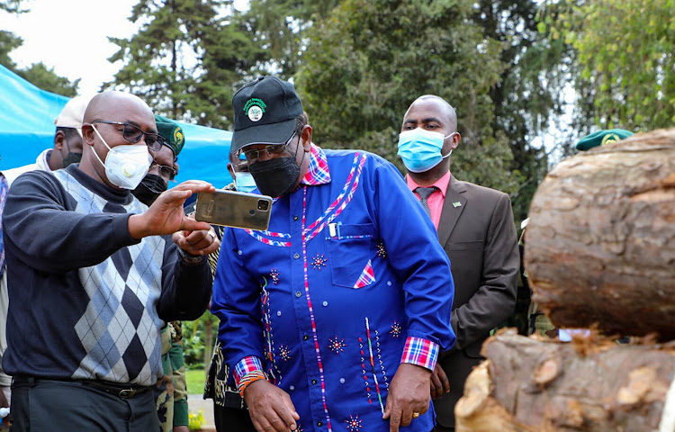 Environment CS Keriako Tobiko and expo participant.