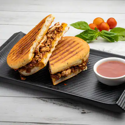 Chicken & Sundried Tomato Basil Tapenade Sandwich In Panini (Non-Veg)