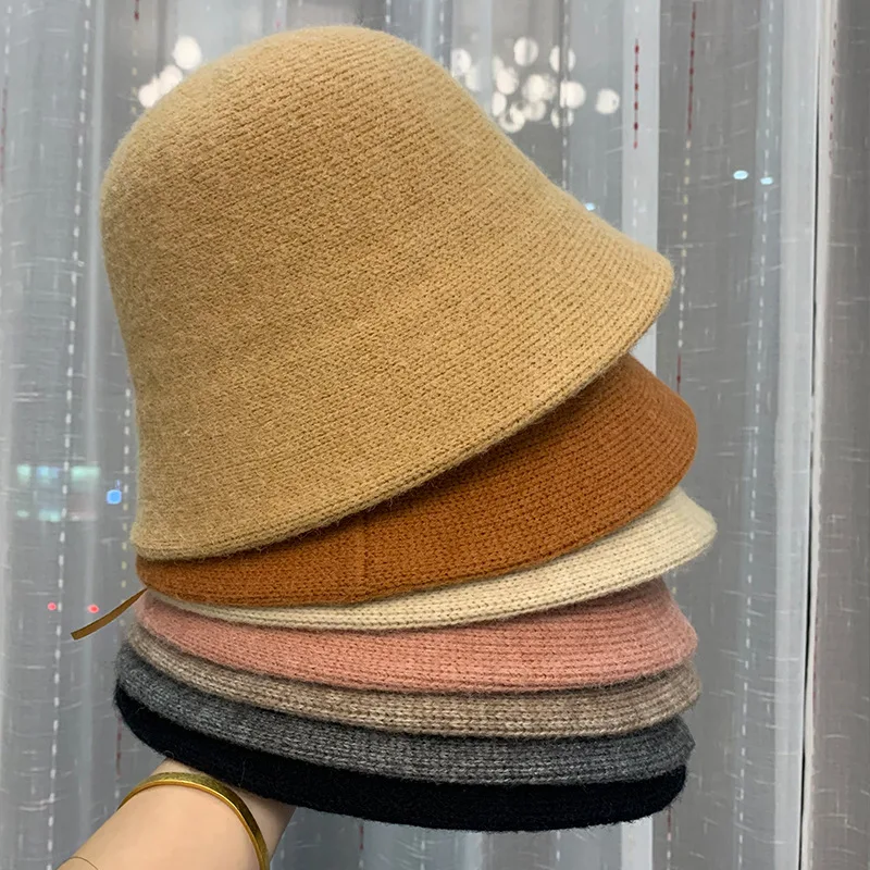 Title 6, Cappello da pescatore lavorato a maglia di lana...