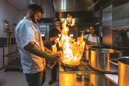 J’Something gets fired up about cooking the kitchen of his new Pretoria restaurant.