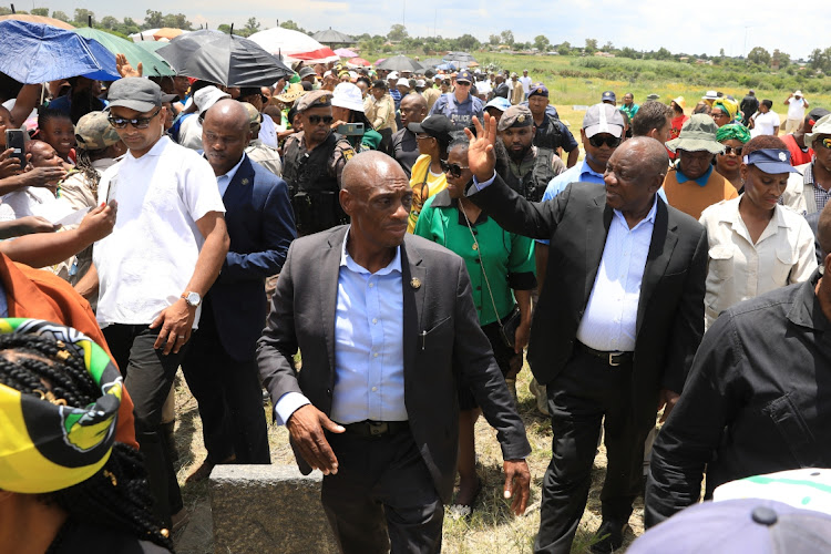 President Cyril Ramaphosa greets residents who came to witness the wreath-laying ceremony at the gravesite of former ANC president Zaccheus Mahabane in Maokeng, Free State.