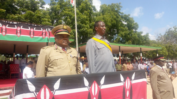 Wajir Governor Mohamed Abdi and county commissioner Loyford Kibaara during Jamhuri Day Celebrations at the Wajir Stadium on Thursday