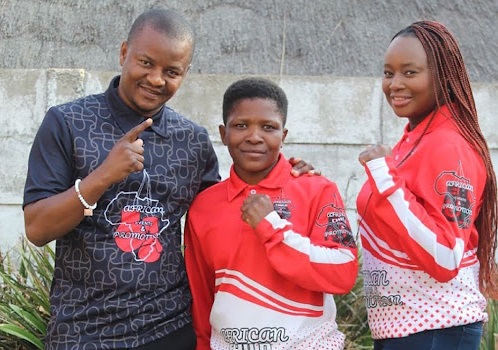 Boxing promoter Mahlatsi Sediane, right, husband and manager Michael Sediane with some if their fighter whe will be in action on September 16.