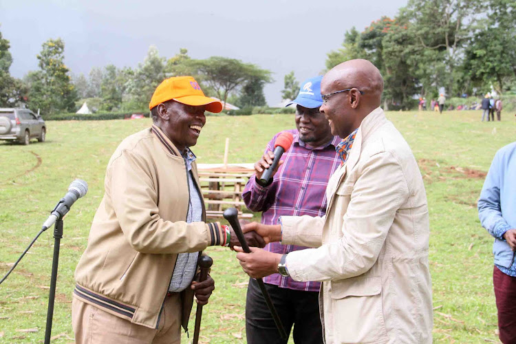 Former councillor Simon Nesiria, Kilgoris Gideon Konchellah and Narok North MP Moitalel ole Kenta in Osupukiai, Shankoe ward, in Transmara West subcounty on Saturday.