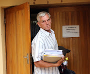 Mark Scott-Crossley appearing at Lenyenye Magistrate's Court for allegedly running over Silence Mabunda in an apparent racist attack in 2018. 