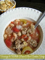 Sausage & White Bean Slow Cooker Soup was pinched from <a href="http://whoneedsacape.com/2014/01/sausage-white-bean-slow-cooker-soup/" target="_blank">whoneedsacape.com.</a>