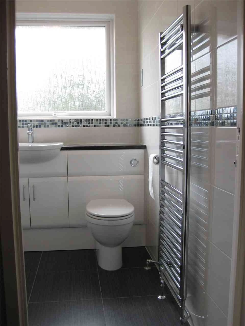 Basin  toilet unit, and towel warmer radiator in Woking