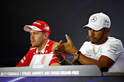 Lewis Hamilton of Great Britain and Mercedes GP and Sebastian Vettel of Germany and Ferrari in the Drivers Press Conference during previews for the Abu Dhabi Formula One Grand Prix at Yas Marina Circuit on November 23, 2017 in Abu Dhabi, United Arab Emirates.