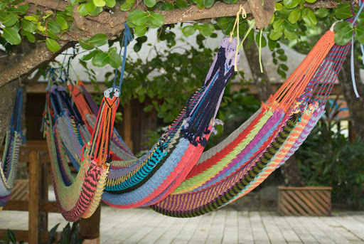 Hammocks-in-Roatan - Kick back and pull up a hammock on Roatan Island in Honduras during your afternoon shore excursion. 