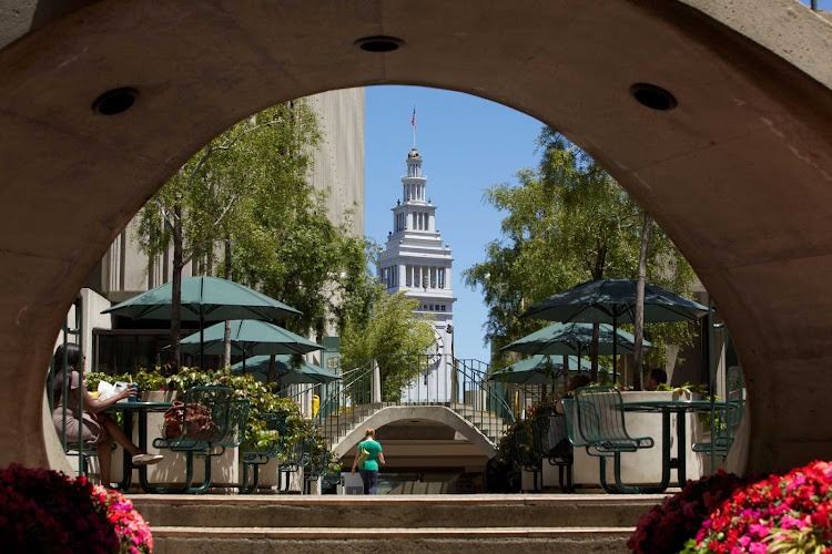 A view of the clock tower rising atop the Ferry Building along  San Francisco's Embarcadero waterfront.